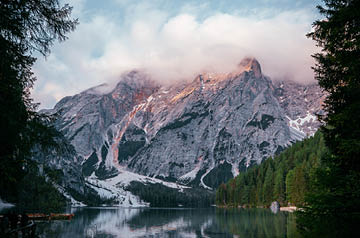 lake, foggy mountains behind