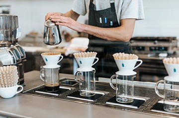 barista preparing pour overs