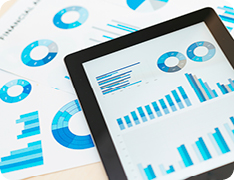tablet with charts on screen